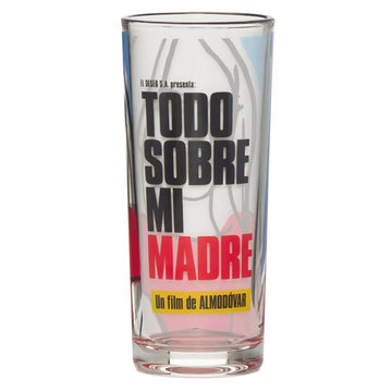 A clear drinking glass with text 'TODO SOBRE MI MADRE' printed on it, set against a plain background. The film ALL ABOUT MY MOTHER by director Pedro Almodovar